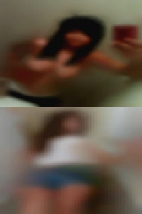 Woman giving swingers oral sex.